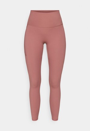 Leggings a vita alta in un colore rosa tenue, realizzati in tessuto elasticizzato. Presentano una tasca laterale e cuciture lisce per una vestibilità confortevole.