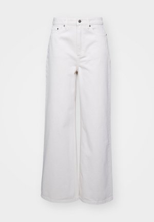 Széles lábú, fehér farmernadrág, strapabíró denimből készült, magas derékkal, öt zsebből álló kialakítással és fém gombos záródással. Sima textúra.