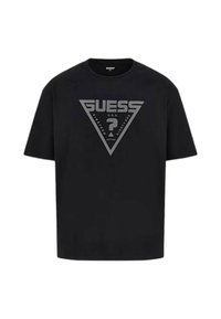 T-shirt in cotone nero con un logo triangolare grigio sul davanti, con il testo "GUESS," insieme a "U.S.A" e un punto interrogativo. Maniche corte.