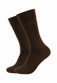 Calzini in cotone marrone con polsini a coste, texture leggera e finitura liscia. I calzini presentano un piccolo logo vicino alla parte superiore.