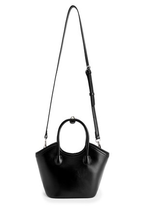 Schwarz Lederhandtasche mit strukturiertem Design, abgerundetem Griff und abnehmbarem Schulterriemen. Hat eine glatte Textur und minimales Zubehör.