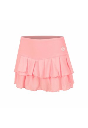 Jupe de tennis rose à plusieurs couches avec une large ceinture et un petit logo blanc sur le côté droit.