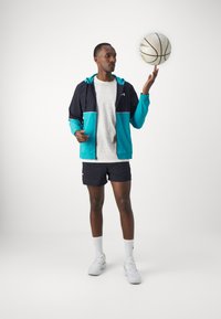 Under Armour ZONE WOVEN - Veste de survêtement - circuit teal/black/white
