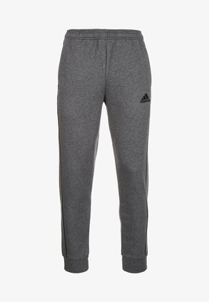 Pantalon de survêtement gris Adidas avec taille élastique, chevilles resserrées, poches latérales et logo Adidas noir sur la cuisse gauche, présenté sur fond blanc.