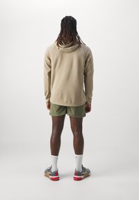 Nike Performance FLEX REP - Pantalón corto de deporte - medium olive/black