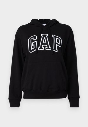 Felpa con cappuccio nera, dotata di tasca a marsupio frontale, con la scritta "GAP" in grandi lettere bianche. Tessuto morbido e polsini a costine.