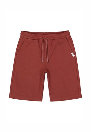 Shorts décontractés couleur rouille avec taille élastique, cordon de serrage, poches latérales et petite étiquette blanche de la marque sur le côté droit.