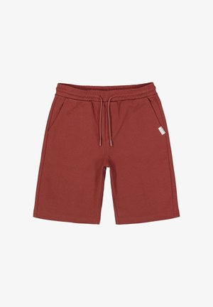 Shorts décontractés couleur rouille avec taille élastique, cordon de serrage, poches latérales et petite étiquette blanche de la marque sur le côté droit.