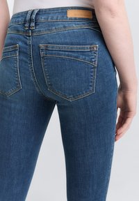 TOM TAILOR DENIM TTJONA - Jeans Skinny - clean mid stone blue denim