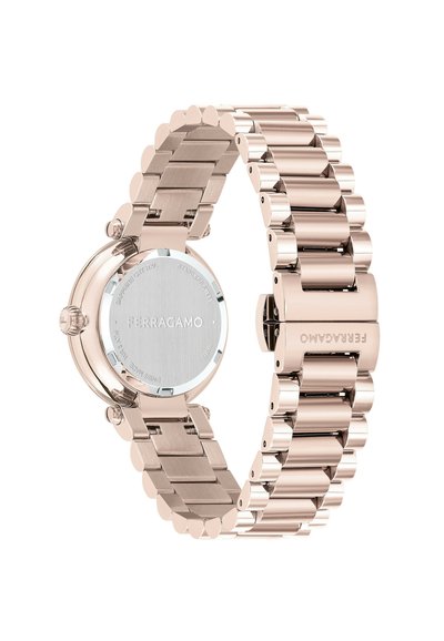 Round rose gold watch with a stainless steel bracelet, featuring a smooth polished finish and engraved brand name on the clasp.