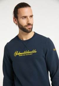 Schmuddelwedda Collegepaita - marine