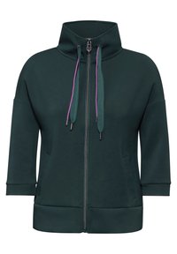 Felpa con zip di un verde scuro, caratterizzata da un colletto alto, maniche corte, cordini viola e verde acqua, e due tasche frontali. Texture del tessuto liscia.