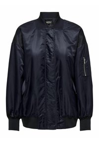 Námořnická modrá bomber bunda s hladkým, lesklým povrchem, vroubkovaným límcem a manžetami a zipovou kapsou na levém rukávu.