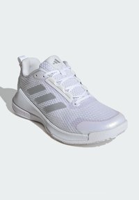 White athletic shoes with a textured mesh upper, light gray accents, three parallel stripes, and a padded collar for support.