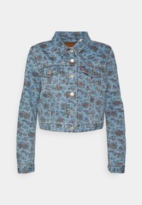 Løs denimjakke i lys blå med blomsterprint. Har to brystlommer, knaplukning og klassisk krave. Tekstureret stof.