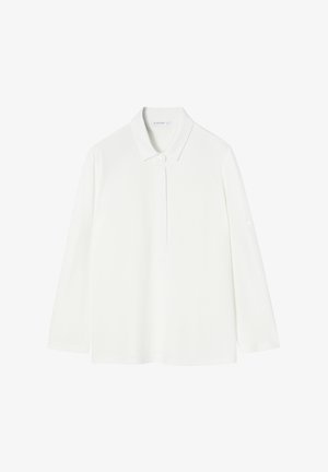 Bela dolga polo majica iz gladkega materiala s klasičnim ovratnikom in sprednjim zapiranjem na šest gumbov. Ima subtilne detajle na ramilih.