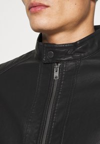 TOM TAILOR Bunda z umělé kůže - black