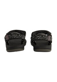 Black and gray synthetic sandals with patterned straps, a thick rubber sole, and an open back design. Textured footbed for comfort.