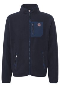 Marineblå fleece-jakke med høy krage, glidelås foran, venstre brystlomme, og to glidelåslommer på siden med blå detaljer.