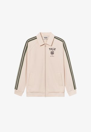 Light beige zip-up jacket with green and white stripes along the shoulders. Features a Yale logo on the chest and two side pockets.