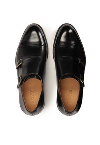 Schwarze Lederschuhe mit glatter Oberfläche, elegantem Design, spitzen Zehen, doppelten Schnallenakzenten und heller Innensohle.