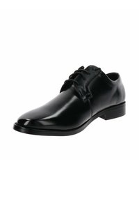 Zwarte lederen dresschoenen met een gladde, glanzende afwerking, ronde neus en vetersluiting. Bevat een lage, platte hak en minimale stikdetails.