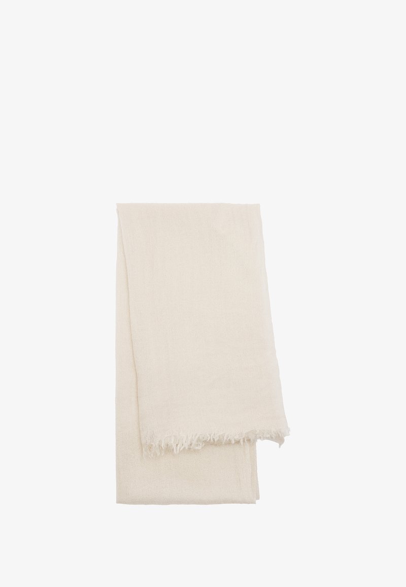 Jasno beżowy szalik wykonany z miękkiego materiału, charakteryzujący się lekko strukturalną powierzchnią i postrzępionymi brzegami. Zestawienie w układzie płaskim ukazuje pełną długość.