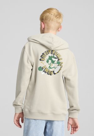 Sudadera con capucha beige con bolsillo tipo canguro, puños y dobladillo acanalados. Presenta un gráfico colorido en la parte trasera que muestra un personaje de dibujos animados y texto.