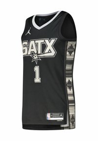 Schwarzes Basketball-Trikot mit weißer "SATX" Schrift, der Nummer "1" und grauen Azteken-Muster Akzenten an den Seiten. Atmungsaktives Mesh-Material.