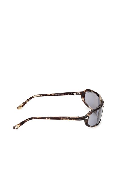 Tortoiseshell frame sunglasses with dark tinted lenses and curved arms, shown from a side angle on a white background.