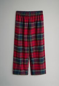 Red plaid trousers with a flannel texture, featuring green, yellow, and white lines. Elastic waistband and loose-fitting cut.