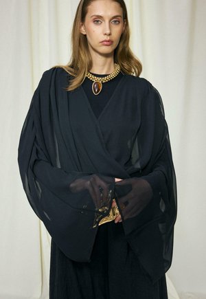 Touché Privé, CROSS-OVER TULLE BLOUSE - Blouse - black