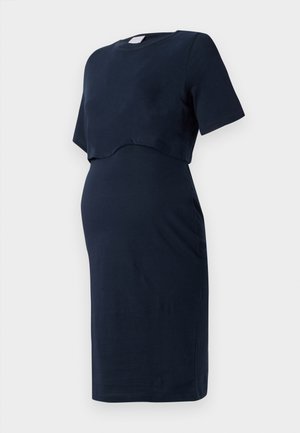 Abito premaman blu navy realizzato in cotone morbido, con maniche corte e un design a sovrapposizione curvada che si adatta a un pancione in crescita.