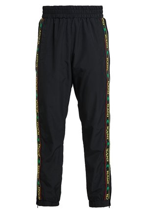 Black athletic pants with elastic waistband and cuffs, featuring green, yellow, and red patterned side stripes with repeating text.