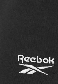 Reebok Urheilushortsit - black