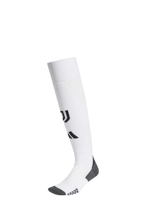 Calza bianca al ginocchio con branding nero. Presenta un tallone e una punta grigi imbottiti. Realizzata in tessuto elasticizzato e traspirante per il massimo comfort.