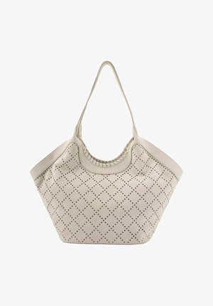 Beige Tragetasche mit diamantförmigem perforiertem Muster, abgerundeten oberen Griffen und breiter Trapezform.