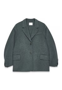 Blazer surdimensionné en gris charbon, fabriqué en laine texturée, avec un col cranté, deux poches avant et une fermeture à deux boutons.
