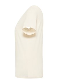 Cream-colored cotton t-shirt with a round neckline and short sleeves. The fabric appears smooth and lightweight. Features a casual fit.