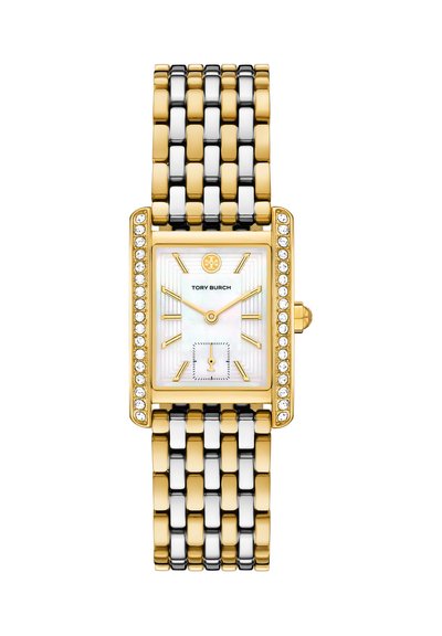 Montre rectangulaire Tory Burch en or et argent avec lunette sertie de diamants, cadran blanc, index dorés et bracelet métallique à maillons.