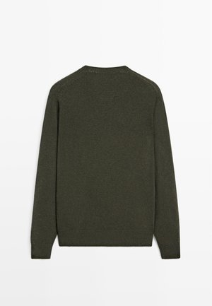 Olive green knit sweater with long sleeves, crew neckline, and ribbed cuffs and hem. Made of soft texture, featuring minimal seams.