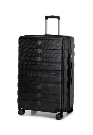 Black hard-shell suitcase with horizontal ridges, a retractable handle, and four wheels. Features a logo on the front and metal accents.