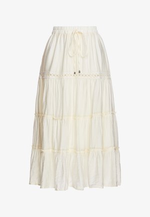 Jupe maxi à volants blanc cassé avec taille élastique froncée et cordon, ornée d'un galon en dentelle autour du volant supérieur.