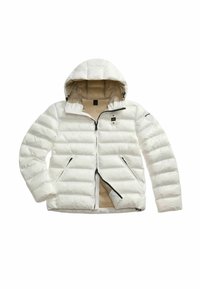 Giacca a vento bianca con cappuccio, zip nera e tasche laterali con zip, che mostra l'interno beige e un'etichetta del marchio sulla manica sinistra.