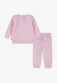 Levi's® HOODIE JOGGER UNISEX - Treniņtērps - crystal rose