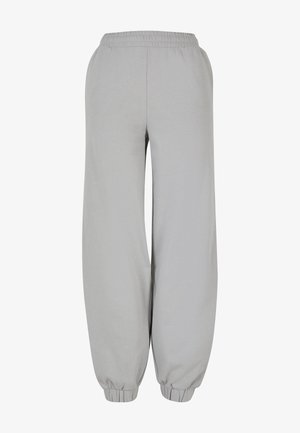 Világosszürke nadrág, elasztikus derékrésszel és redőzött szárral, puha, sima textúrájú anyagból készült. Laza szabású dizájn.