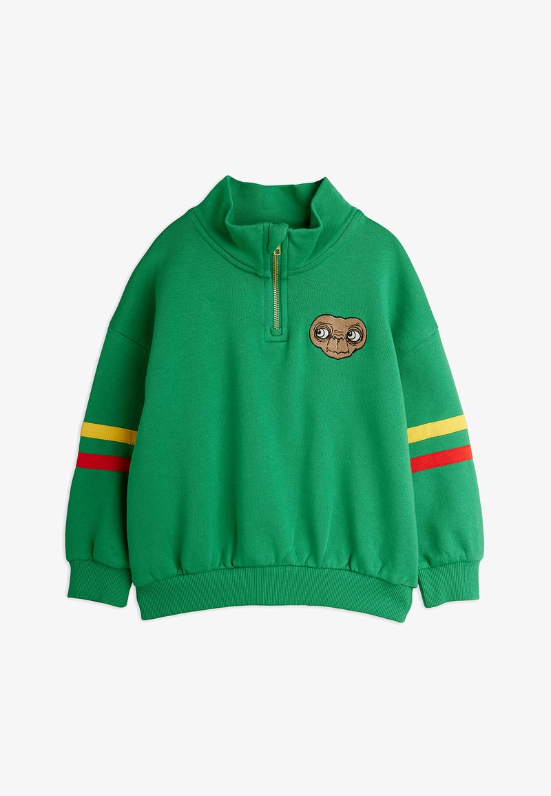 Zelený pulóver so zvýšeným golierom, ktorý má zips na prednej strane a výšivku tváre mimozemšťana. Prúžky v červených a žltých akcentoch.