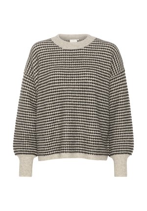 Pull en tricot crème et noir, avec un motif à rayures et des pois. Encolure ronde, épaules tombantes et poignets côtelés. Texture douce.