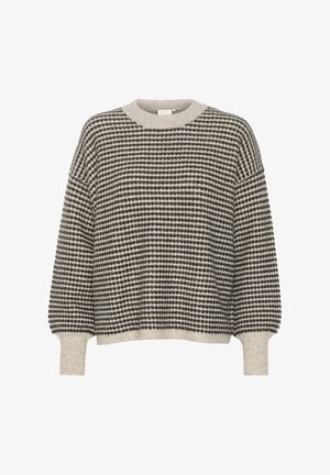 Pull en tricot crème et noir, avec un motif à rayures et des pois. Encolure ronde, épaules tombantes et poignets côtelés. Texture douce.