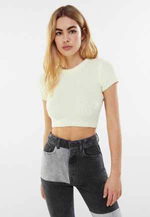 MIT KURZEN ÄRMELN UND ZIERKNOTEN AUF DEM RÜCKEN - T-shirt con stampa - yellow